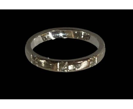 18 carat white gold diamond set wedding band ring, size M.