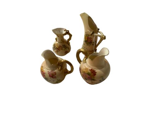 Four Royal Worcester blush ware jugs.