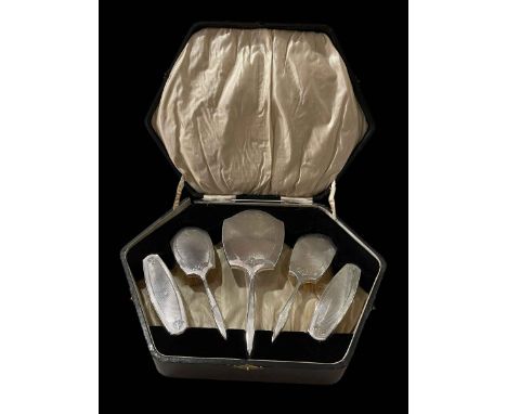 Cased silver engine-turned five piece brush and mirror set, London 1929.
