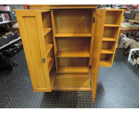 Light Wood Cupboard with Shelved Interior 