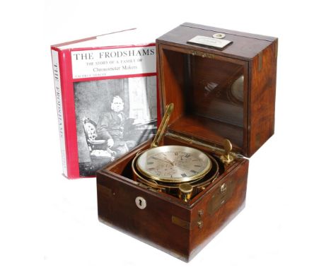 A Victorian walnut cased two day marine chronometer by Frodsham & Keen, the circular single fusee brass movement with four tu