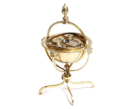 A late 18th century French copper and gilt brass globe inkstand, the cone finial with a button mechanism releasing hinged sid