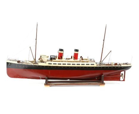 An early 20th century model passenger steam boat, painted wood, with metal details and with a rigged mast, the lift-off top r