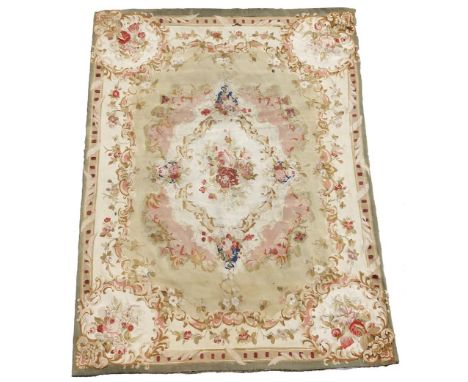 A French Aubusson tapestry rug, in Louis XVI style, decorated with roses, 198 x 145cm. click  here to view the page turning c