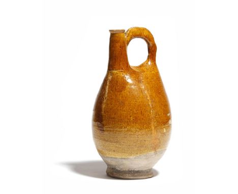 A Chinese ochre glazed pottery pilgrim flask, Liao Dynasty, 23.5cm high.Provenance: Christie's South Kensington, Oriental Wor