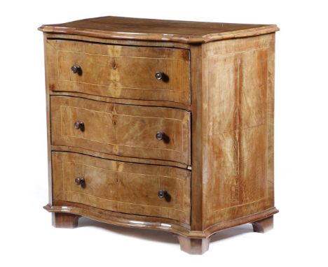 A 19th century Italian serpentine commode, possibly olive wood or walnut, inlaid with stringing, the crossbanded top with a m