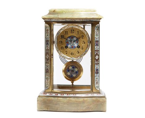 A late 19th century French champlevé enamel four-glass mantel clock, the eight day movement striking on a gong and stamped 'M