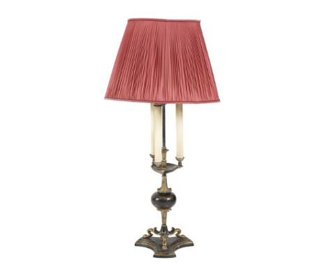 A Victorian japanned tôle and parcel gilt candelabra, converted to a table lamp, with three lights, above a ball stem and tri