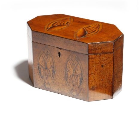 A George III fruitwood tea caddy, of canted rectangular form, inlaid with marquetry panels of conch shells and urns of flower