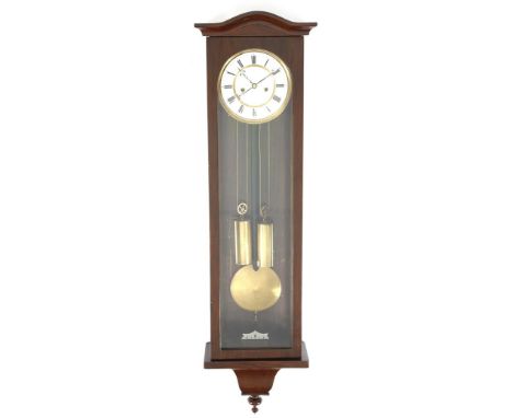 A late 19th century Austrian Vienna regulator wall clock, the eight day movement striking on a gong, the enamel dial with Rom