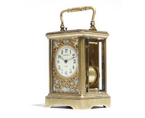 A late 19th century French gilt brass carriage clock, the repeating eight day movement with a platform lever escapement and s