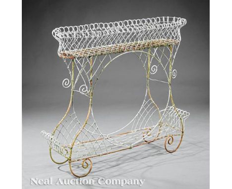 English Wirework Scroll Motif Plant Stand , oval basket, scroll work base, stretcher shelf , h. 34 in., w. 40 1/2 in., d. 10 