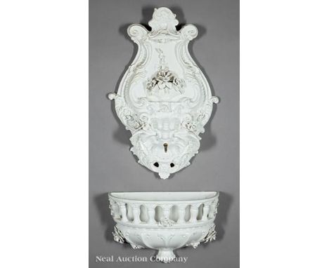 Italian "Blanc-de-Chine" Ceramic Lavabo , late 19th c., scrolled font with winged mask, the galleried basin with applied flow