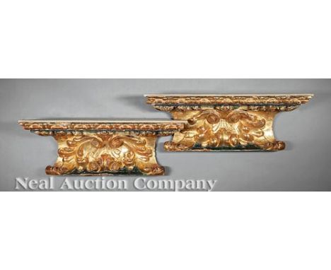 Pair of Continental Painted Giltwood Architectural Fragments , 19th c., possibly Italian, carved with a central shell flanked