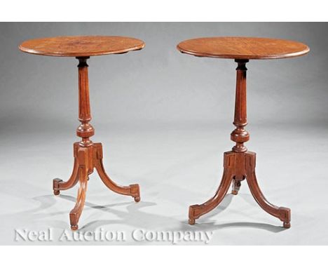 Pair of Swedish Neoclassical-Style Carved Oak Tea Tables , 19th c., each with circular top, tapered fluted standard, arched m