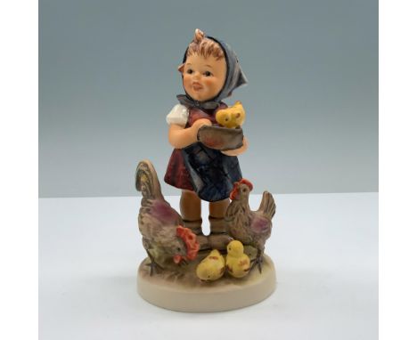 Hand painted porcelain with matte finish features a young girl feeding a chicken family. Goebel backstamp. M. I. Hummel impre
