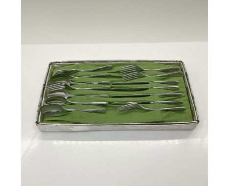 This adorable set includes 4 each of forks, knives, and spoons along with a serving spoon and master knife. Marked Like Mothe