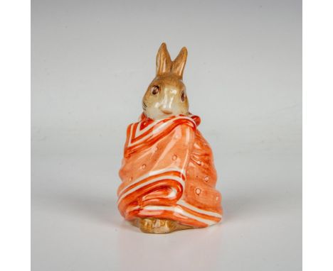 Rabbit snuggling in a reddish-brown blanket. This item has its original box measuring 3"L x 3"W x 4.25"H. Beswick backstamp. 