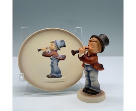 Hand painted porcelain set with matte finish features a figurine with a matching miniature plate of a little boy playing the 