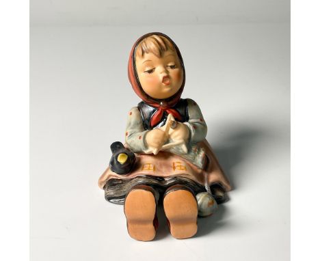 Hand decorated figure of a girl knitting with a bird. Artist impressed signature in the base. Goebel Hummel backstamp. This i