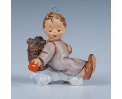 Hand decorated figure of an adorable boy giving a heart from the full of basket. Artist impressed signature and number at the