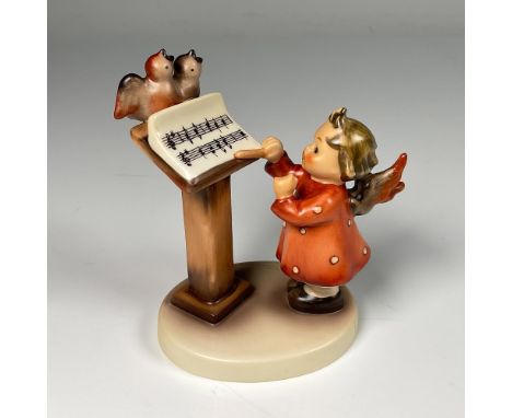 Hand decorated figure of an adorable angel conducting music with two birds singing. Artist impressed signature in the base. G
