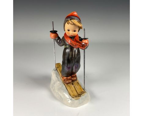 Hand decorated figure of an boy ready to hit slopes. Artist impressed signature in the base. Goebel backstamp. This item incl