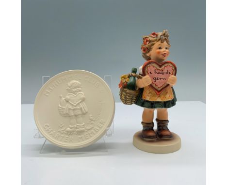 Hand painted porcelain set with matte finish part of the collectors club features a Special Edition N1 of a little girl holdi