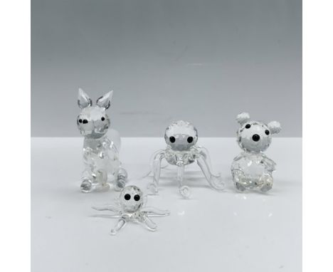 Charming collection of Swarovski styled figures that includes a fox with a frosted tail, a teddy bear, an octopus standing on