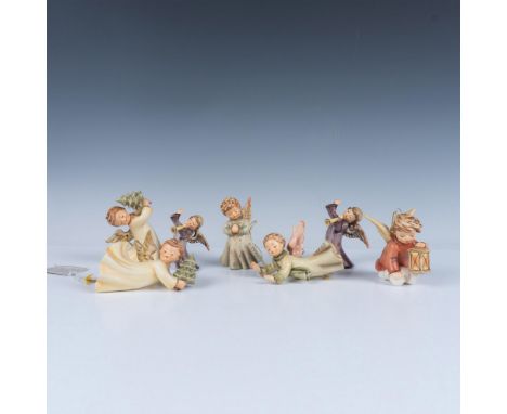 Hand painted porcelain set with three Annual Collectible Ornaments: 1991 Angelic Guide (3.5"H), 1990 Peace on Earth (4"H) and