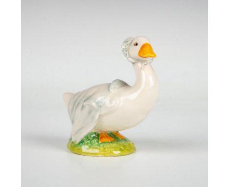 Modeled in white feathers with blue and white bonnet and blouse. This item has its original box measuring 3"L x 3"W x 4.25"H.