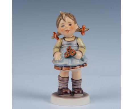 Hand decorated exclusive special edition figure of an adorable smiling girl holding red flowers. Artist impressed signature o