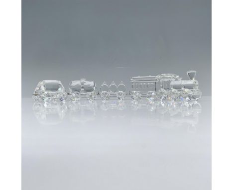 Adorable crystal clear set that includes a locomotive, a passenger carriage, a three barrel cart, a tank wagon, and a tipping