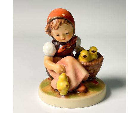 Hand decorated figure of a figure of an adorable girl gathering three chicks in her woven basket. Artist impressed signature 