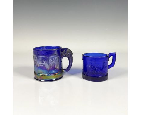 Iridescent blue cup with Heisey Imperial Nursery Rhyme pattern, and an elephant and trunk handle, along with a small blue gla