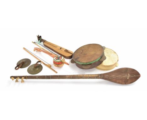 Group of mainly Middle Eastern instruments, two zilli masa (Turkish tong cymbals), a keman?e (a Turkish spike fiddle from Tra