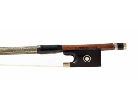 German violin bow by and stamped K. Penzel***, the stick octagonal, the ebony frog inlaid with silver rings enclosing pearl e