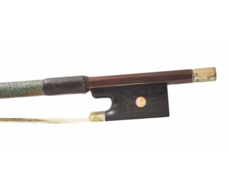 English silver mounted violin bow by W.E. Hill & Sons, stamped H & S, the stick round, the ebony frog inlaid with pearl eyes 