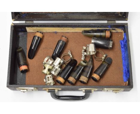 Good selection of eight clarinet mouthpieces of various brands; together with a barrel joint and eight ligatures