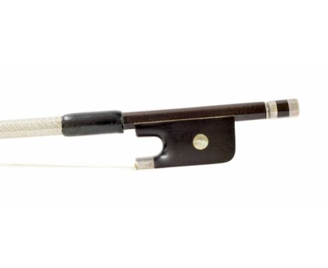 Good silver mounted violoncello bow stamped G.A. Chanot, the stick octagonal, the ebony frog inlaid with pearl eyes and the e