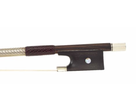 Silver mounted violin bow stamped Chanot, the stick round, the ebony frog inlaid with pearl eyes and with a silver overlaid e