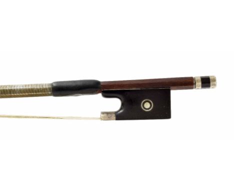 Interesting silver mounted violin bow, unstamped, the stick octagonal, the ebony frog inlaid with silver rings enclosing pear