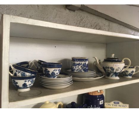 SHELF OF OLD WILLOW PATTERNED TEA WARE ETC