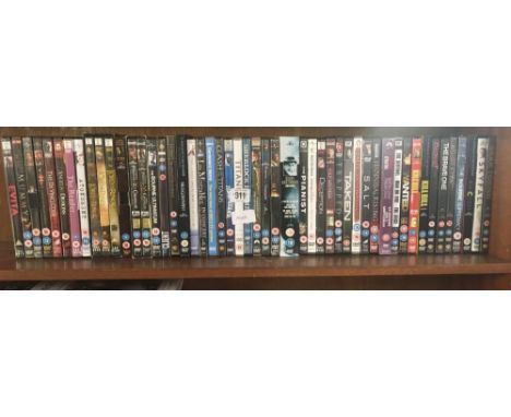 SHELF OF DVD'S