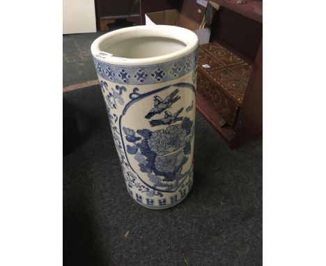 A BLUE &amp; WHITE CHINA STICK STAND