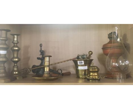 SHELF OF BRASS WARE INCL; PESTLE &amp; MORTAR, INK WELL, CHAMBER STICK, CANDLE STICKS, MINCER ETC