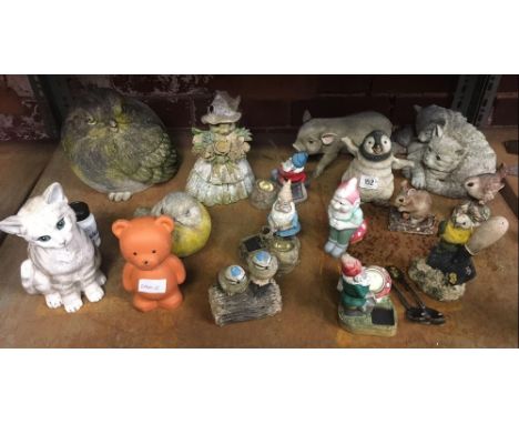 SHELF OF GARDEN ORNAMENTS, GNOMES ETC