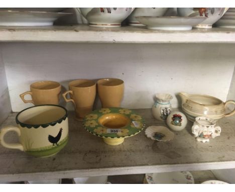 SHELF OF CHINA WARE CONSISTING OF COFFEE CUPS ETC &amp; SOME CRESTED WARE