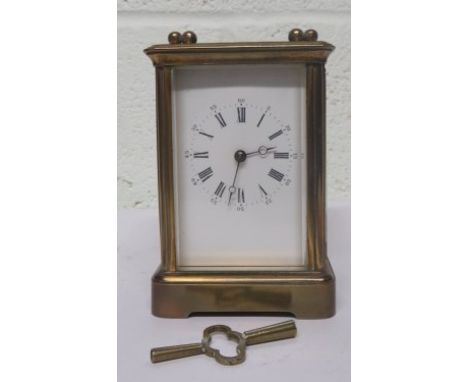 20th century gilt brass carriage clock, with Roman Numeral and Numerical dial, 12cm high