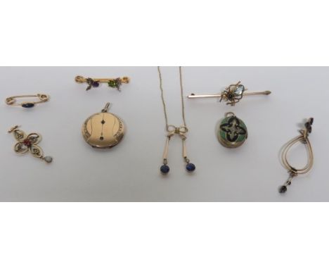 A collection of early 20th century, and later jewellery, to include two unmarked yellow metal openwork pendant pieces, one wh